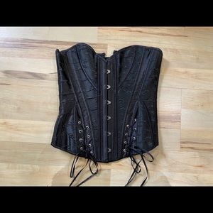 Black satin corset with embroidery and boning